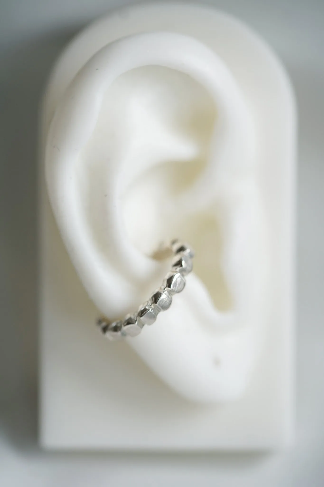 Round silver ear cuff