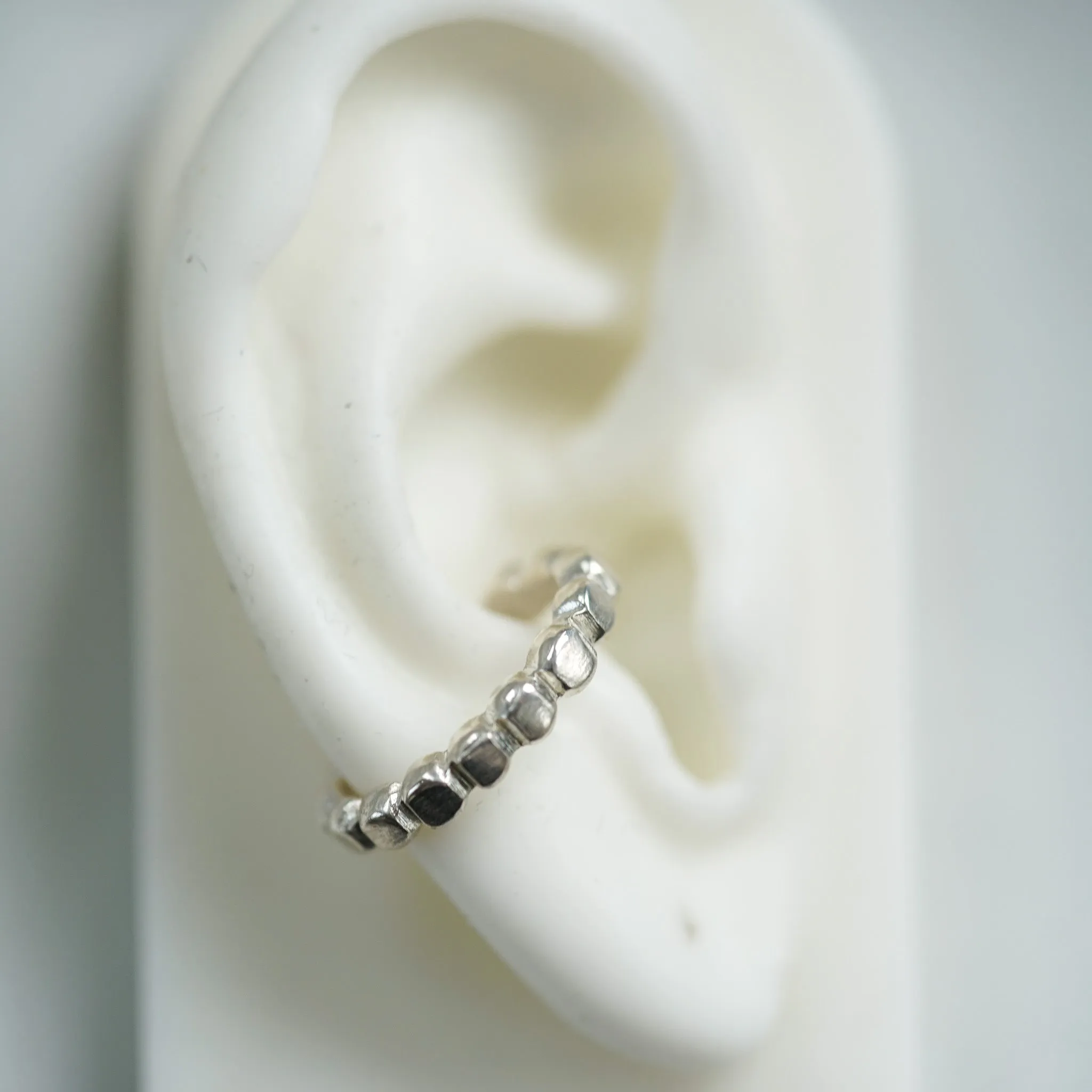Round silver ear cuff